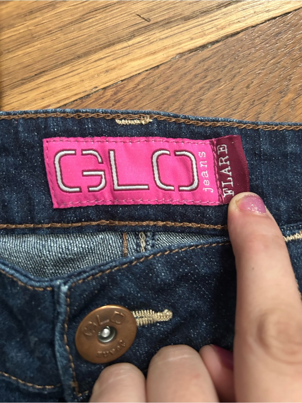 GLO jeans women’s dark denim with pink logo label